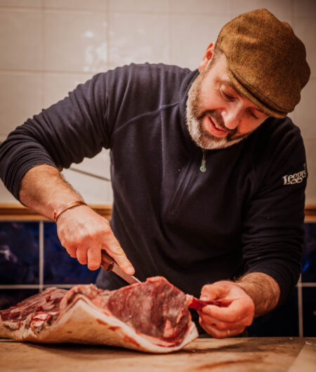 Anthony Legge cutting beef