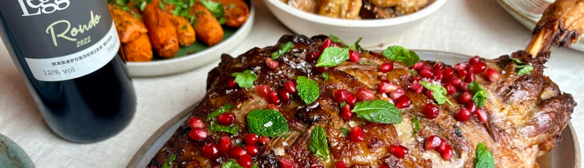 Balsamic glazed lamb shoulder with roast cumin carrots and tahini roasties