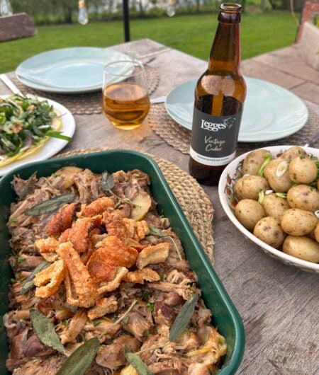 Slow roast pork shoulder with apple and cider gravy