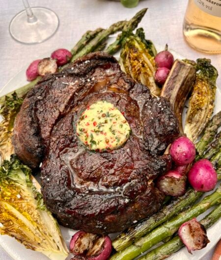 BBQ Tomahawk with tarragon and pink peppercorn butter