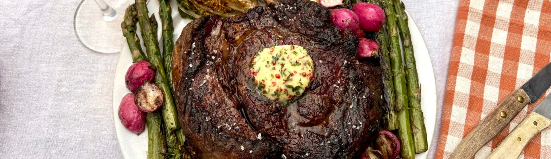 BBQ Tomahawk with tarragon and pink peppercorn butter
